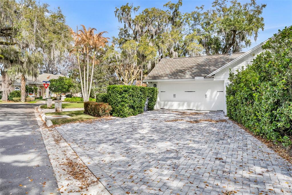 700 Pinetree Road Winter Park, FL 32789 - Photo 57 of 58 a view of a yard with plants and trees
