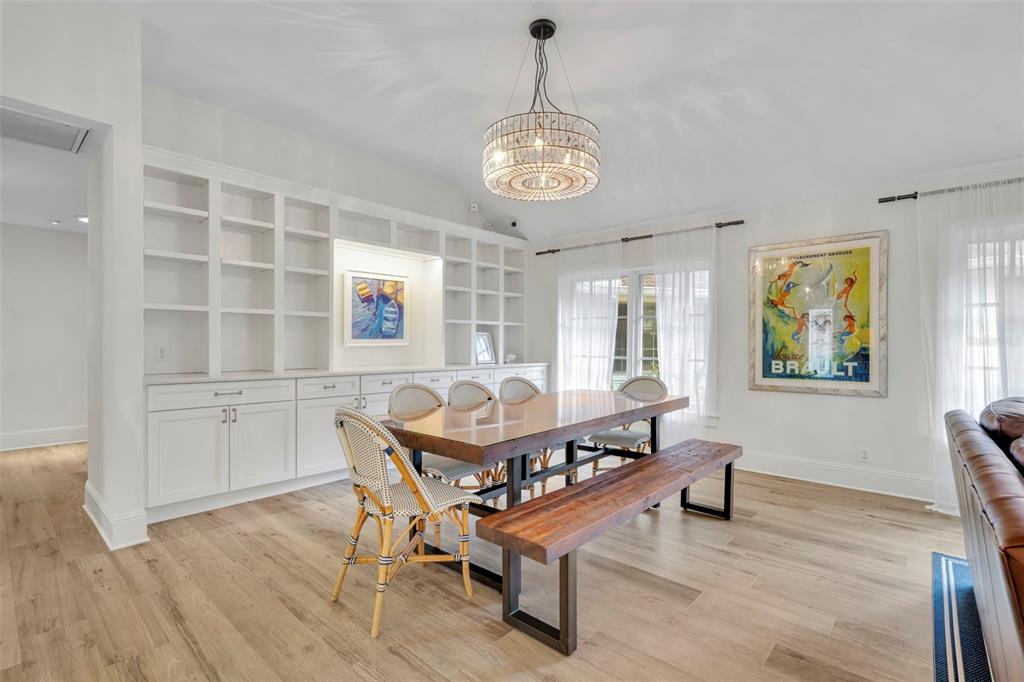 700 Pinetree Road Winter Park, FL 32789 - Photo 7 of 58 a dining room with furniture and window