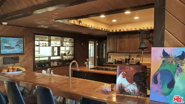 a kitchen with granite countertop lots of counter top space