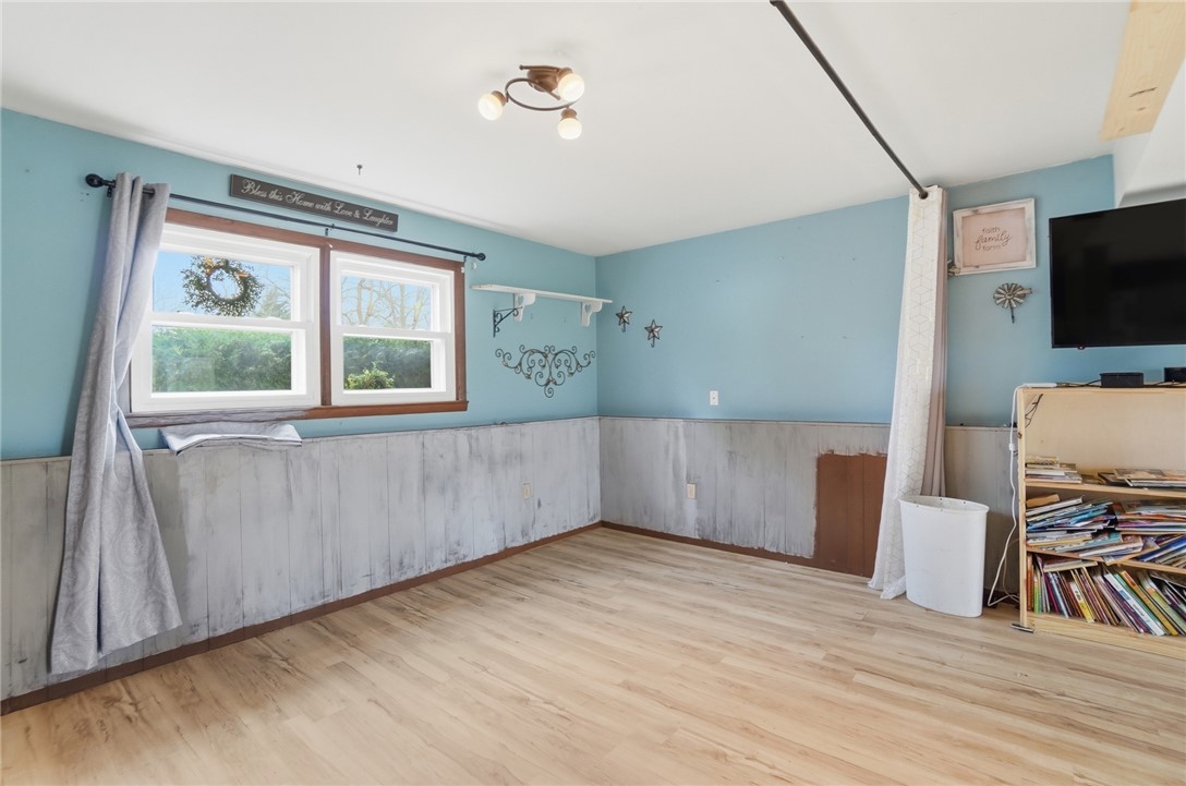 290 Ginghamsburg Road Tipp City, OH 45371 - Photo 32 of 49 This versatile room features durable flooring and ample natural light, ready for your personal touch.