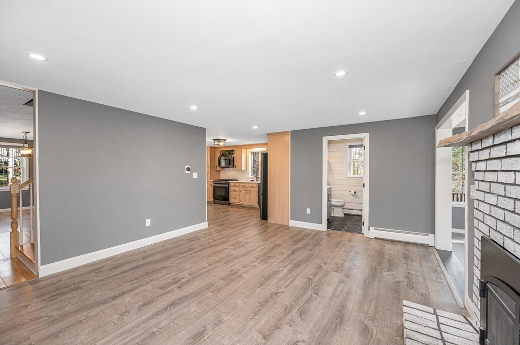 17 Autumn Street Windham, NH 03087 - Photo 13 of 42 a view of empty room with wooden floor