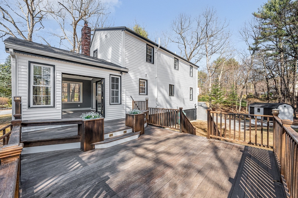17 Autumn Street Windham, NH 03087 - Photo 21 of 42 a view of a house with a patio and a yard
