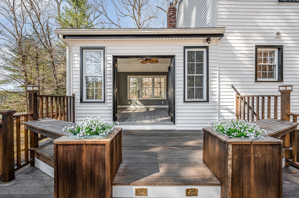 17 Autumn Street Windham, NH 03087 - Photo 22 of 42 a front view of a house with a porch