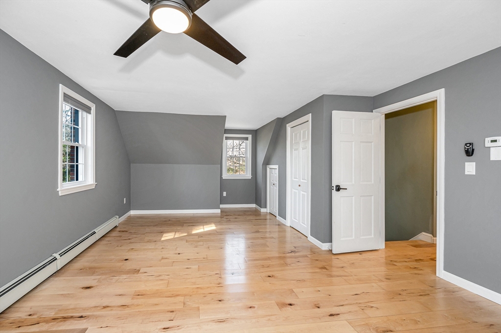 17 Autumn Street Windham, NH 03087 - Photo 25 of 42 a view of an empty room with window and wooden floor