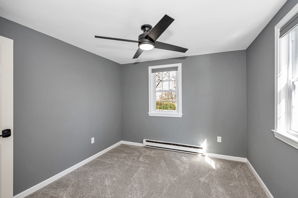 17 Autumn Street Windham, NH 03087 - Photo 31 of 42 a view of an empty room and window