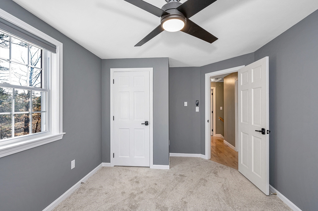 17 Autumn Street Windham, NH 03087 - Photo 32 of 42 a view of an empty room with a window