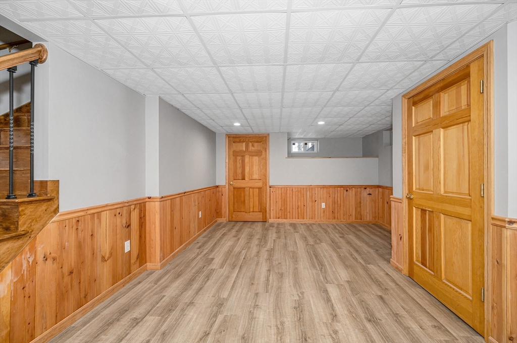 17 Autumn Street Windham, NH 03087 - Photo 37 of 42 a view of hallway with wooden floor