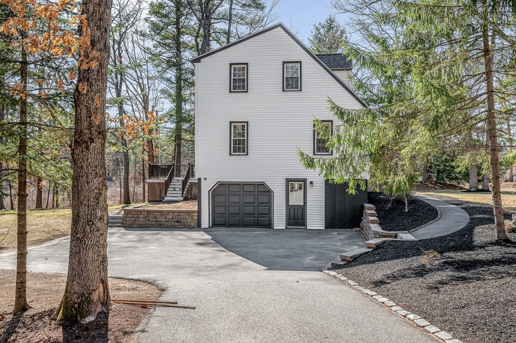 17 Autumn Street Windham, NH 03087 - Photo 39 of 42 a view of a house with backyard
