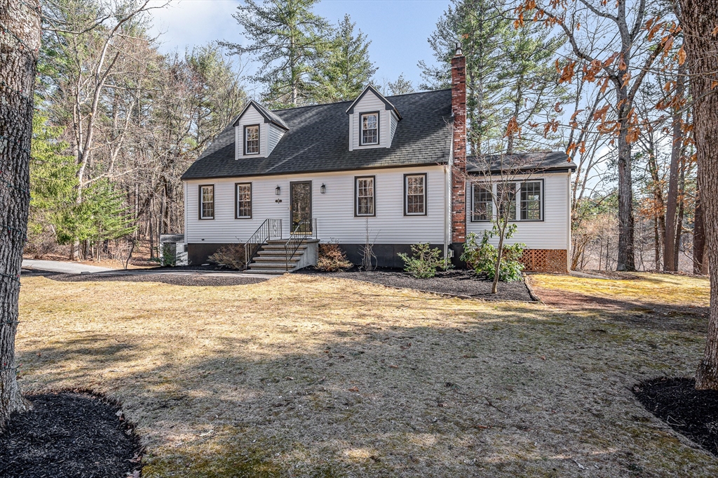 17 Autumn Street Windham, NH 03087 - Photo 41 of 42 a front view of a house with a yard