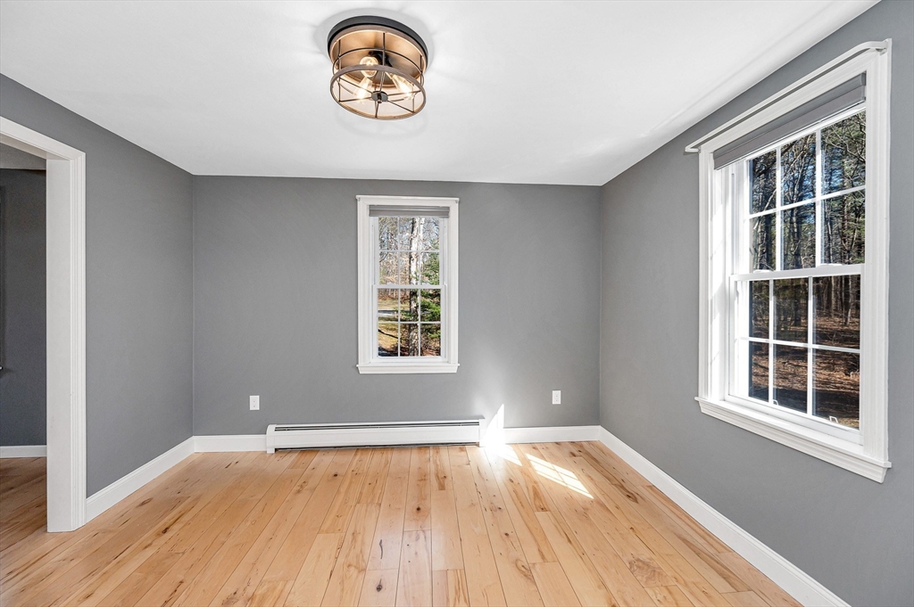 17 Autumn Street Windham, NH 03087 - Photo 5 of 42 an empty room with a window
