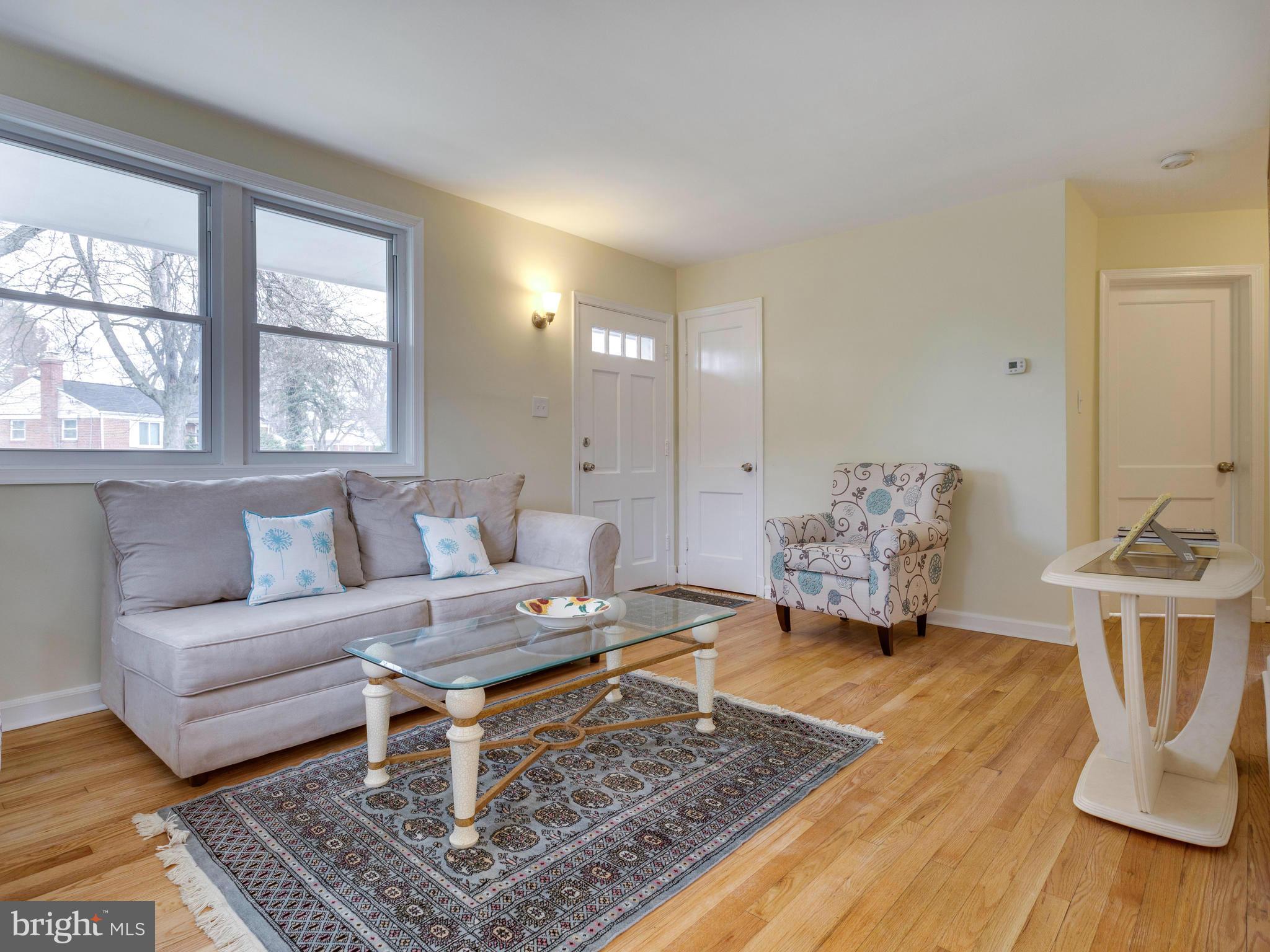 4002 Gannon Road Silver Spring, MD 20902 - Photo 3 of 30 a living room with furniture and a rug