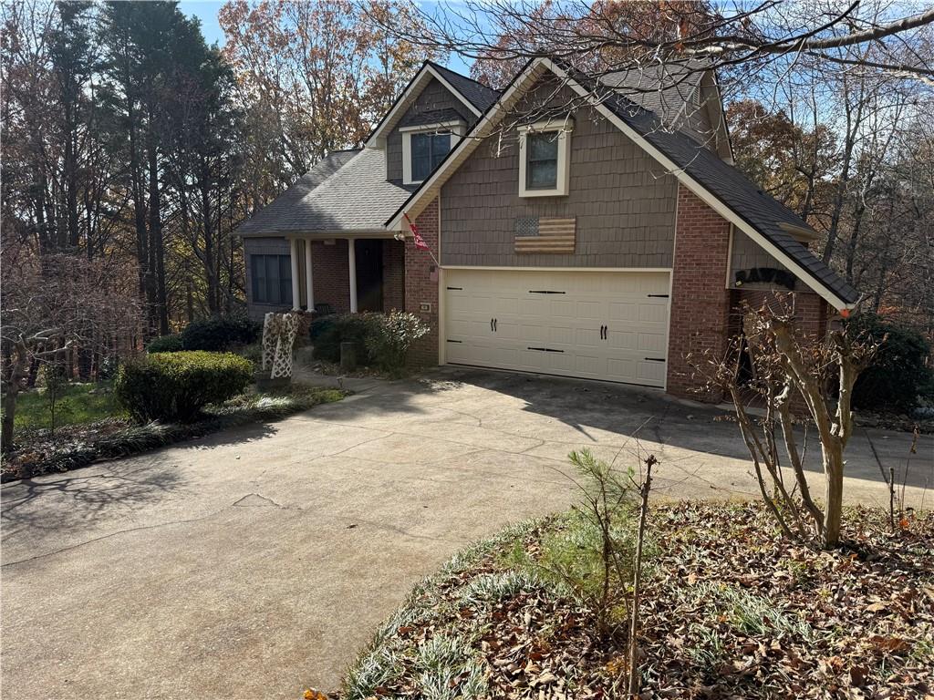 76 Remington Lane Jasper, GA 30143 - Photo 2 of 19 a front view of a house with a yard