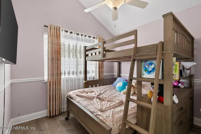 a bathroom with a sink mirror toilet and vanity