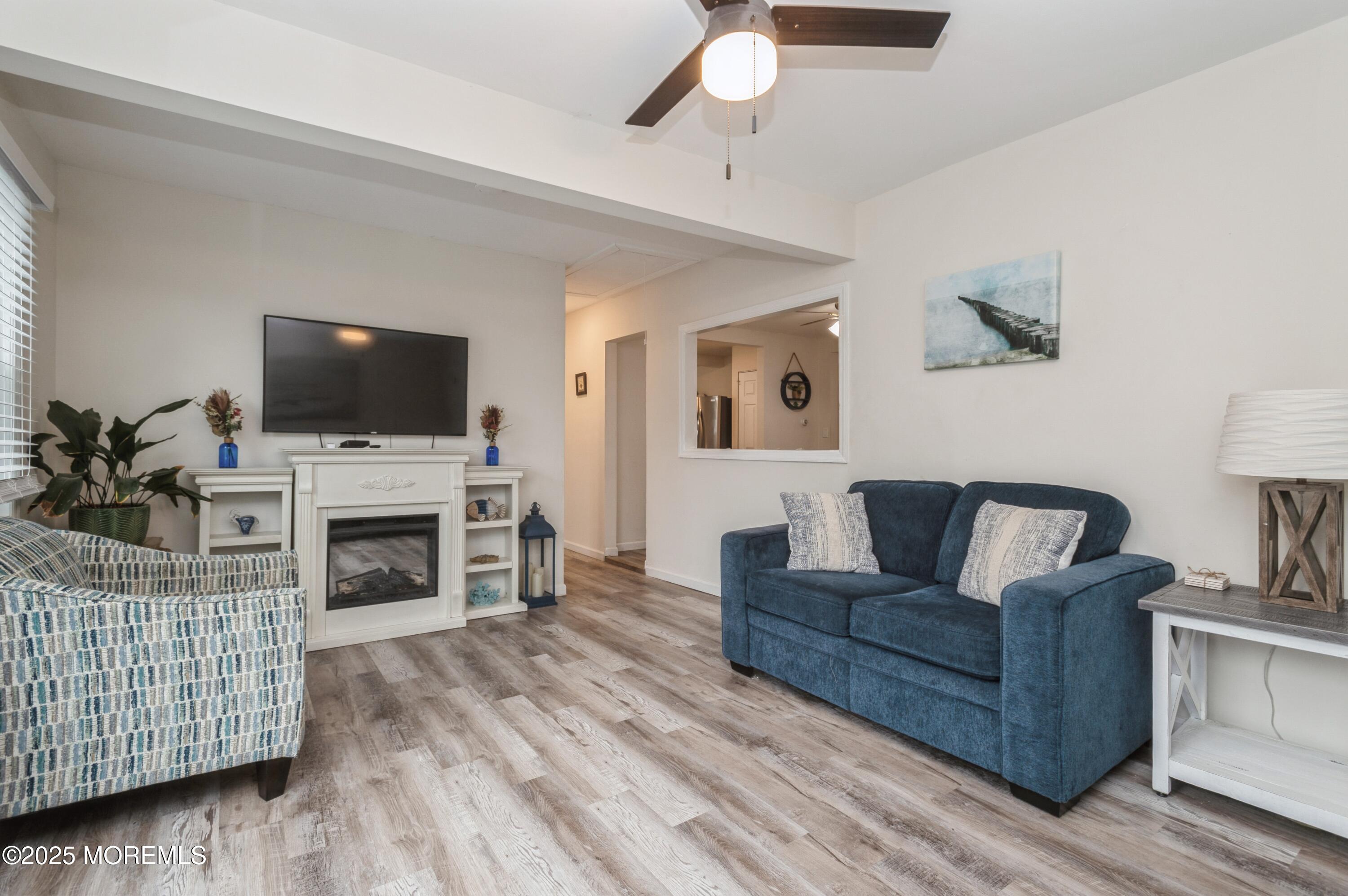 45 Lancaster Road Brick, NJ 08723 - Photo 6 of 25 06_45LancasterRd_10001_LivingRoom_HiRes