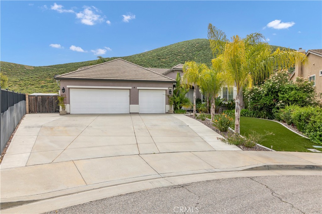 28073 Whittington Road Menifee, CA 92584 - Photo 1 of 1 a view of a house with a yard