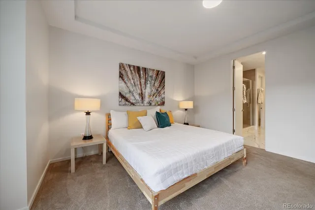 a bathroom with a shower sink and mirror