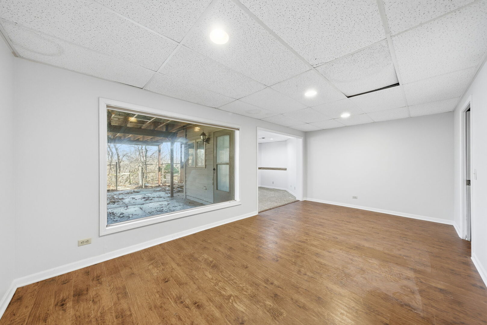 21 Canyon Court Oswego, IL 60543 - Photo 33 of 40 a view of an empty room with glass door