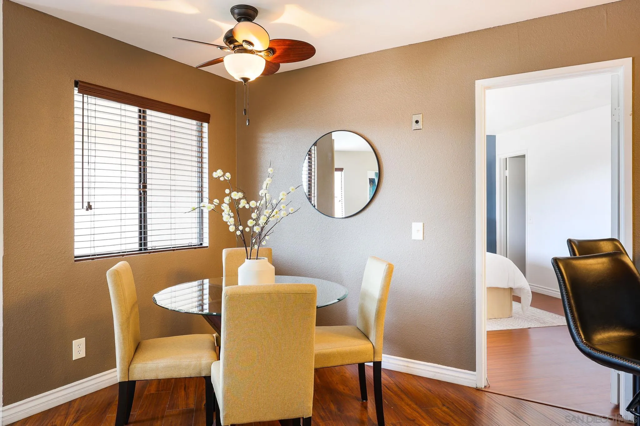 2946 Anawood Way Spring Valley, CA 91978 - Photo 15 of 45 a dining room with furniture a window and a chandelier