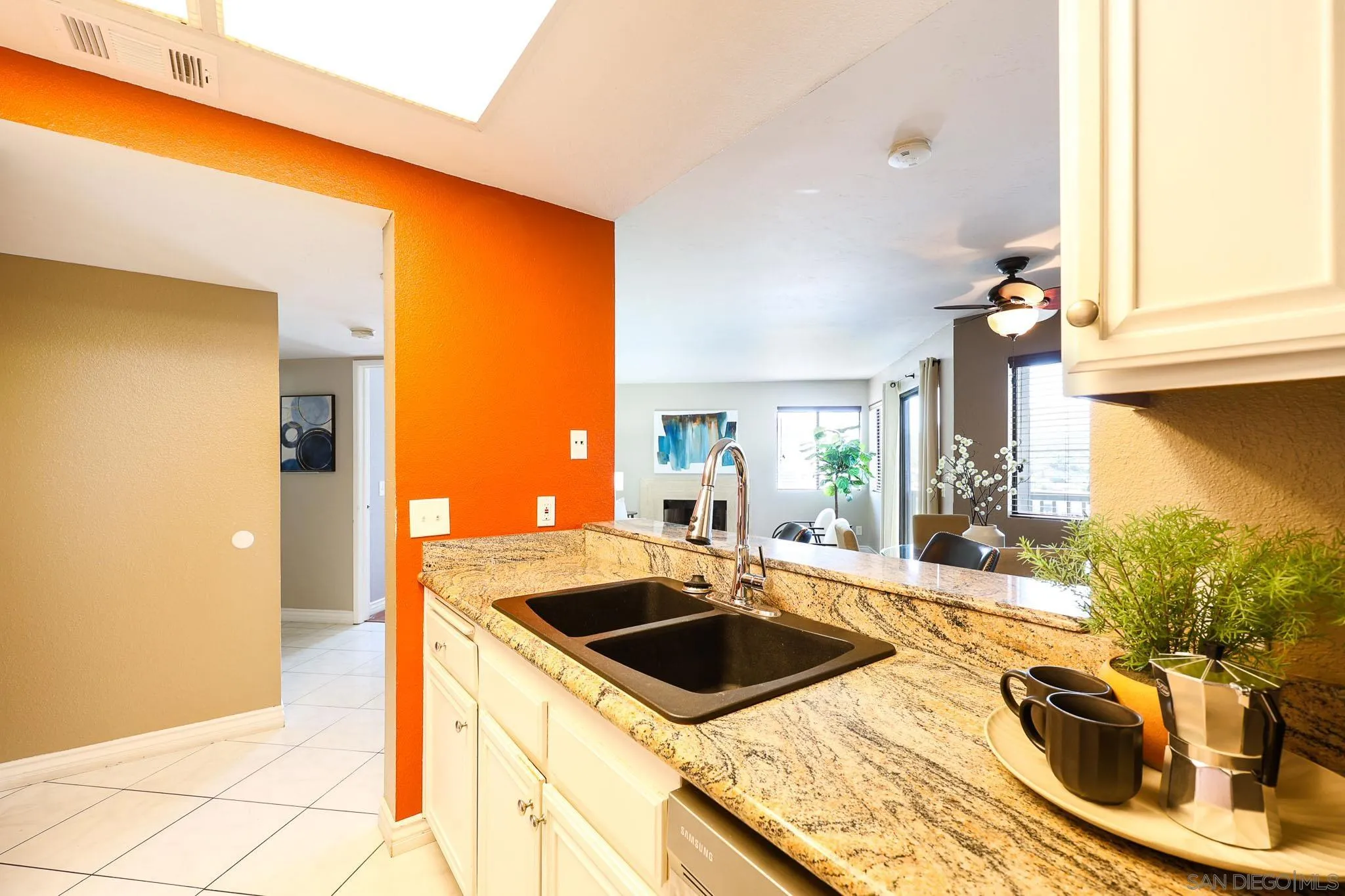2946 Anawood Way Spring Valley, CA 91978 - Photo 18 of 45 a kitchen that has a sink and a stove