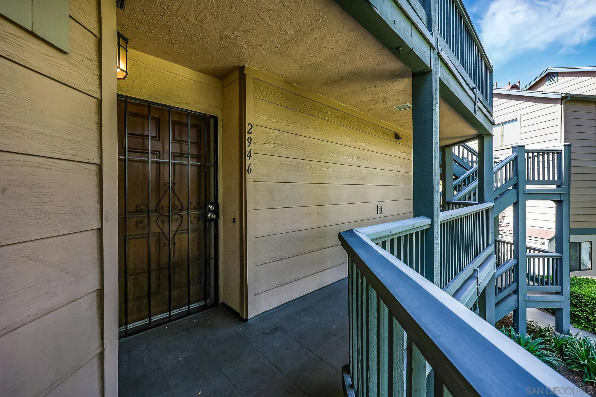 2946 Anawood Way Spring Valley, CA 91978 - Photo 2 of 45 a view of balcony with wooden floor and fence