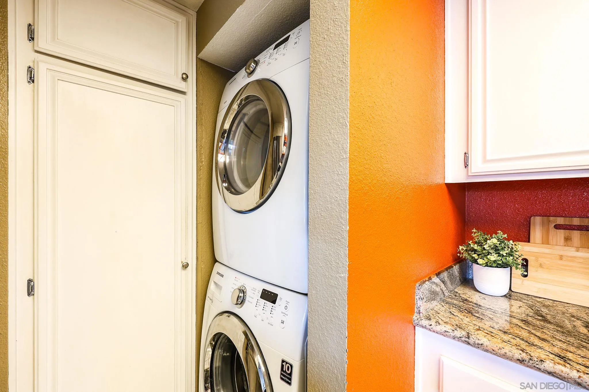 2946 Anawood Way Spring Valley, CA 91978 - Photo 22 of 45 a utility room with dryer and washer