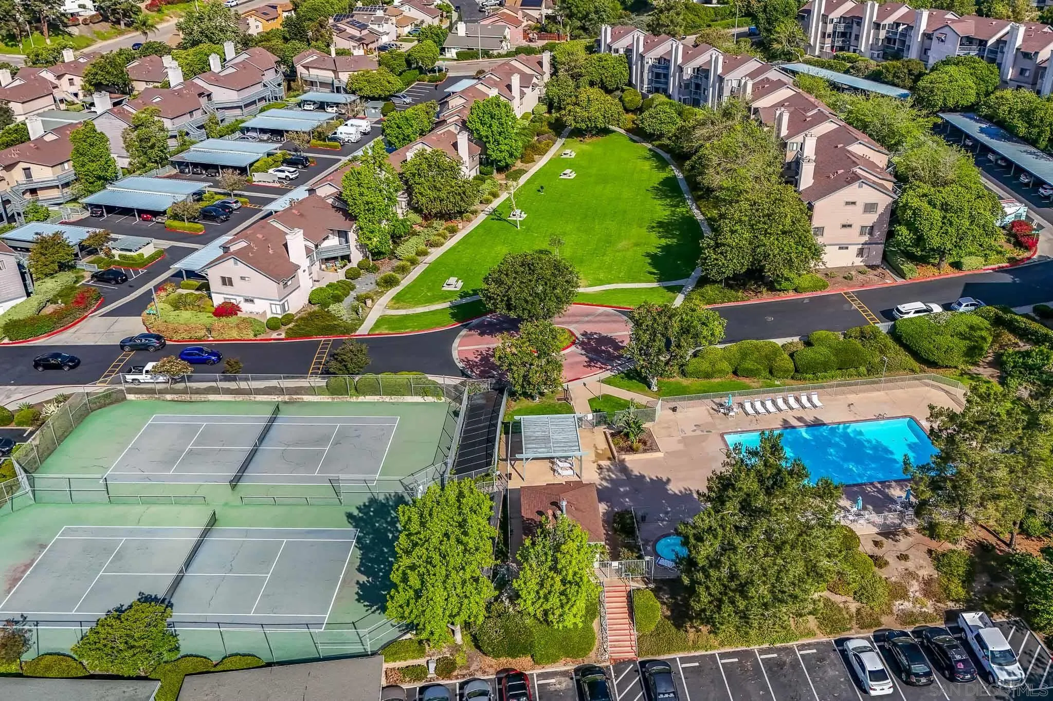 2946 Anawood Way Spring Valley, CA 91978 - Photo 40 of 45 an aerial view of a tennis ground and large trees