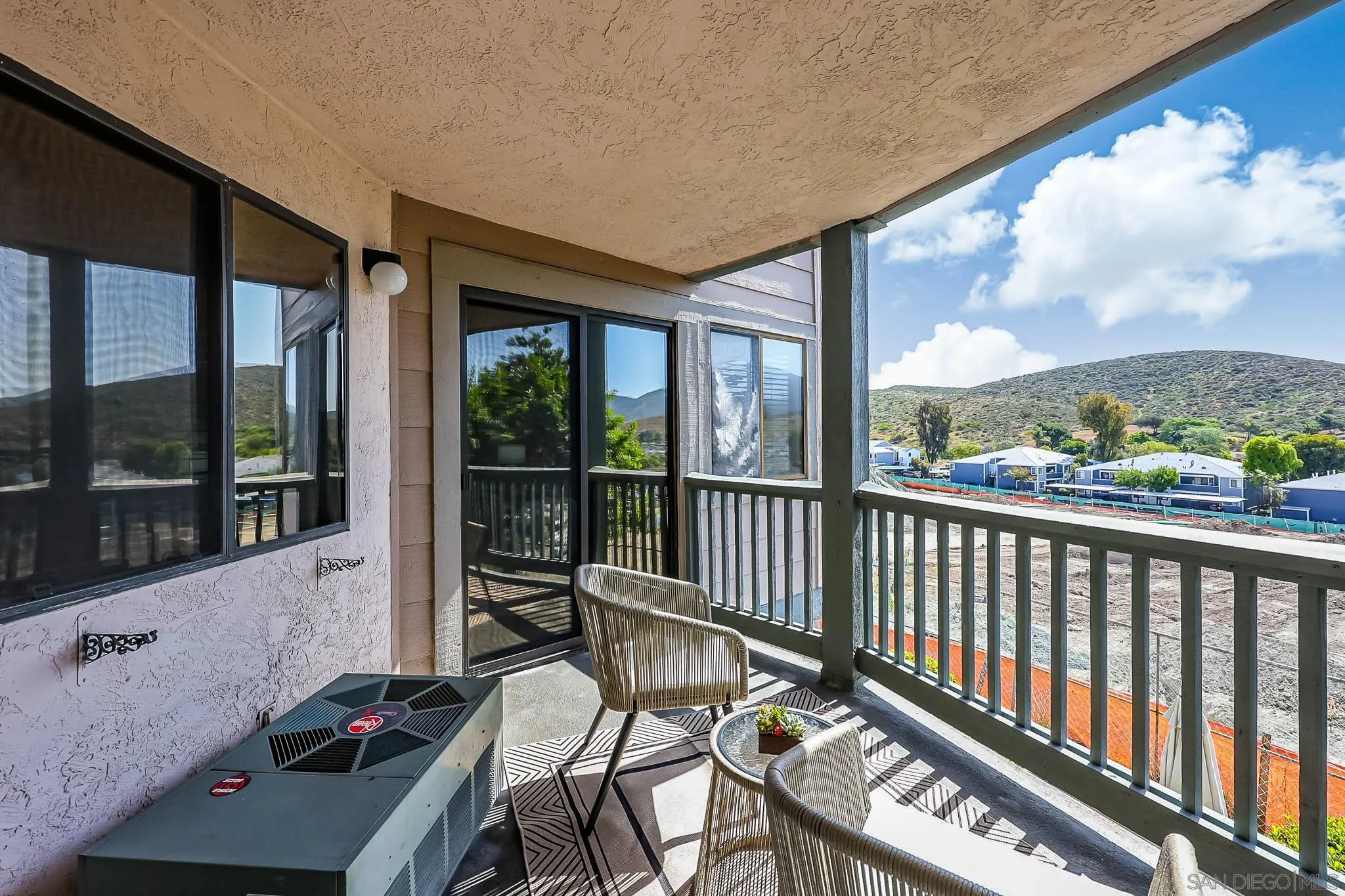 2946 Anawood Way Spring Valley, CA 91978 - Photo 9 of 45 a view of a chairs and table in the balcony