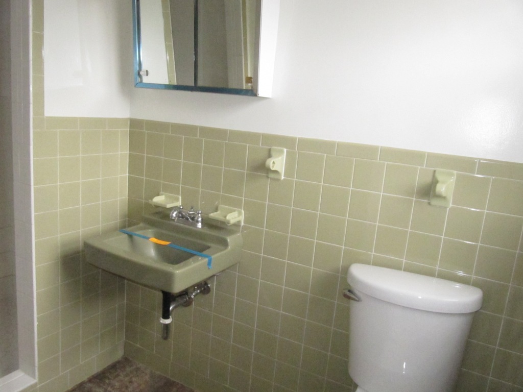 3587 Edwardsville Road Hardy, VA 24101 - Photo 8 of 12 a bathroom with a sink a toilet and a mirror