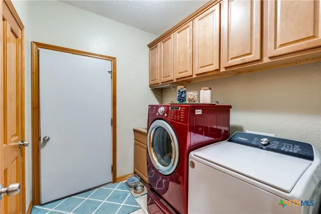 a view of a chairs on the roof deck