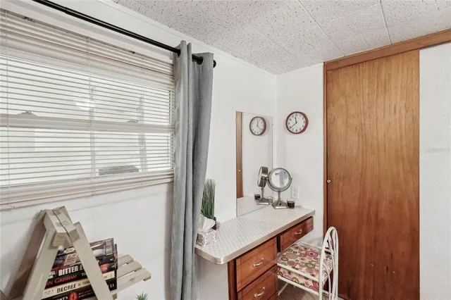 a view of a hallway with workspace
