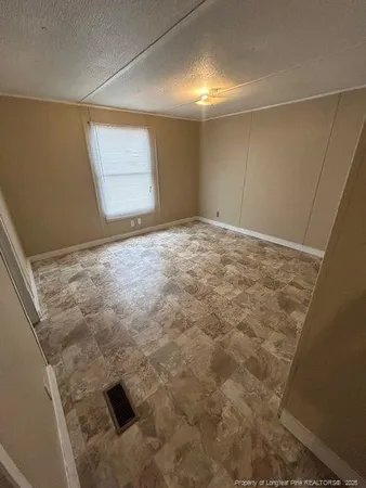 a view of empty room with an empty space