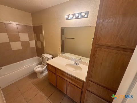4208 Elms Run Circle Killeen, TX 76542 - Photo 12 of 23 a bathroom with a sink a toilet and shower