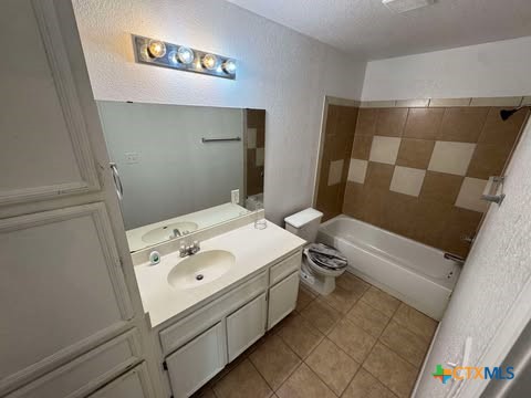 4208 Elms Run Circle Killeen, TX 76542 - Photo 20 of 23 a bathroom with a sink a toilet and shower