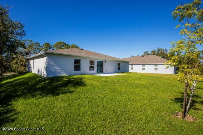 462 Hazel Street Sebastian, FL 32958 - Photo 2 of 18 a front view of house with yard and seating area