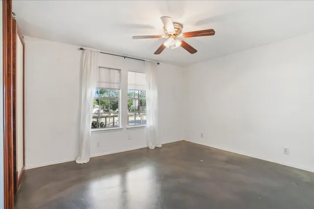 a bathroom with a sink a mirror a toilet and a bathtub