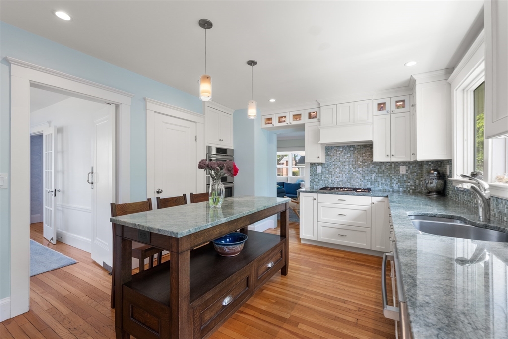 8 Charlotte Road Marblehead, MA 01945 - Photo 14 of 37 a kitchen with granite countertop a sink a counter space appliances and cabinets