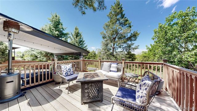a view of a two chairs in the porch