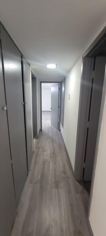 1855 Ramon Road, Unit 24 Palm Springs, CA 92264 - Photo 8 of 18 a view of hallway with stainless steel appliances wooden floor