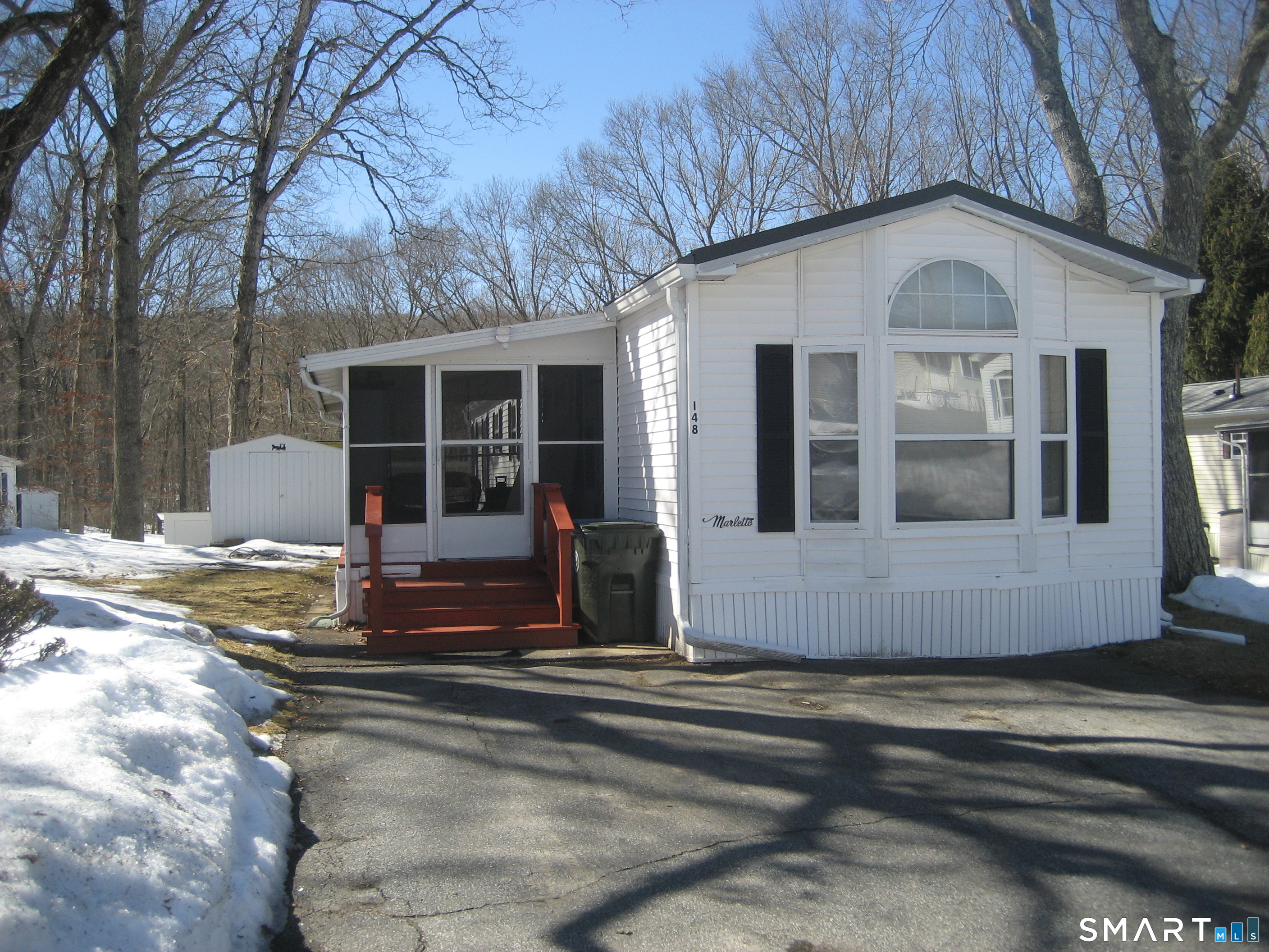 136 Hunters Road Norwich, CT 06360 - Photo 1 of 16 a front view of a house with a garden
