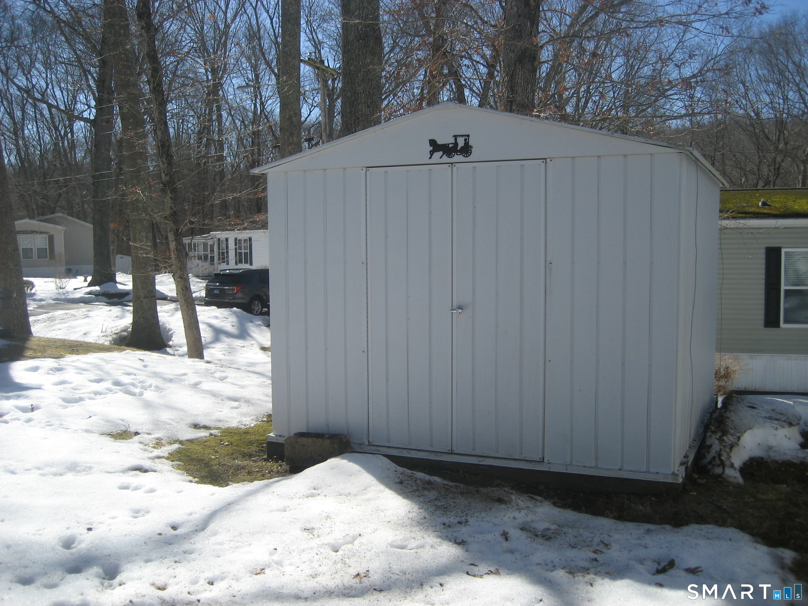 136 Hunters Road Norwich, CT 06360 - Photo 15 of 16 a view of a backyard of the house