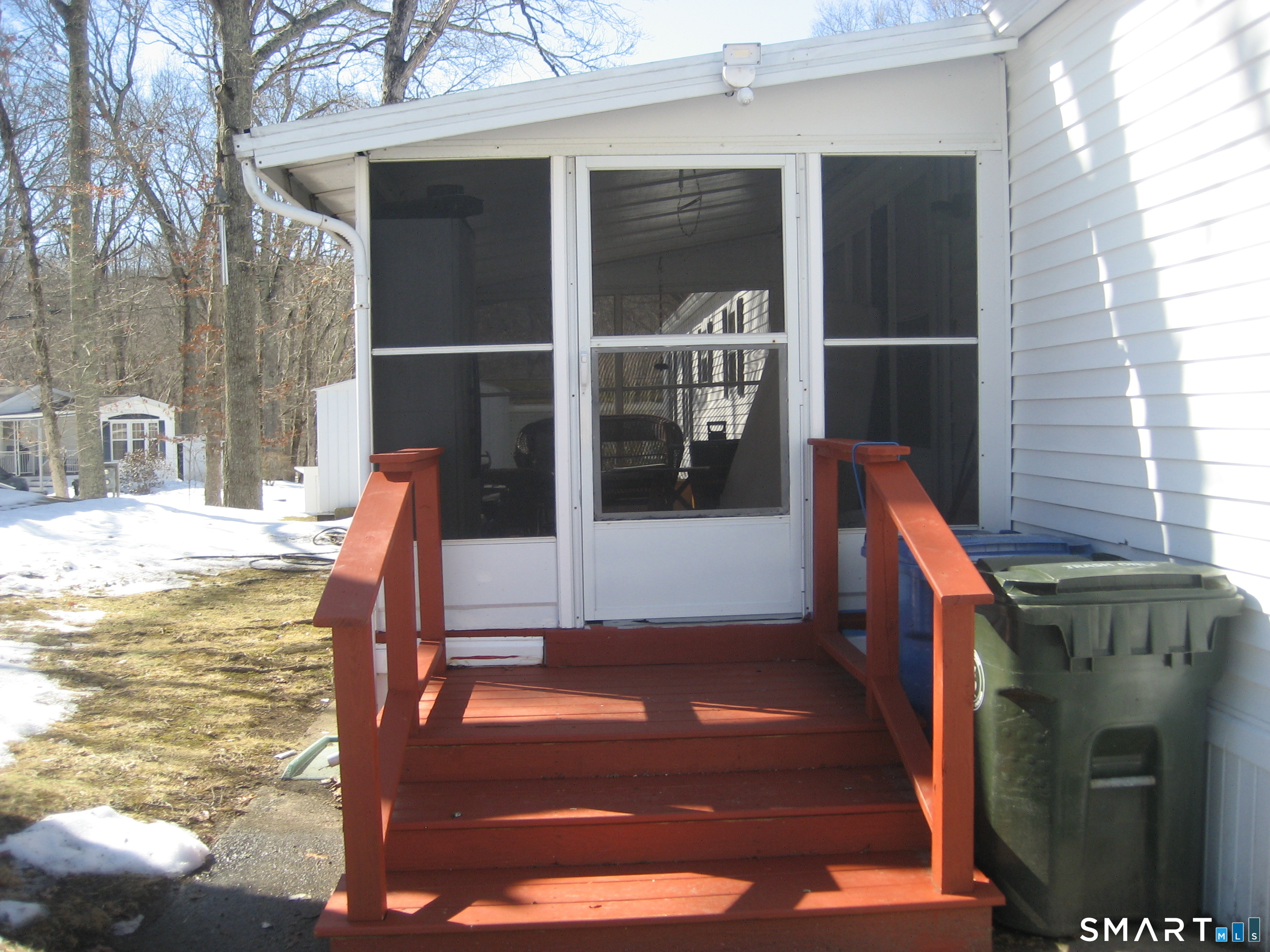 136 Hunters Road Norwich, CT 06360 - Photo 2 of 16 a view of deck with patio