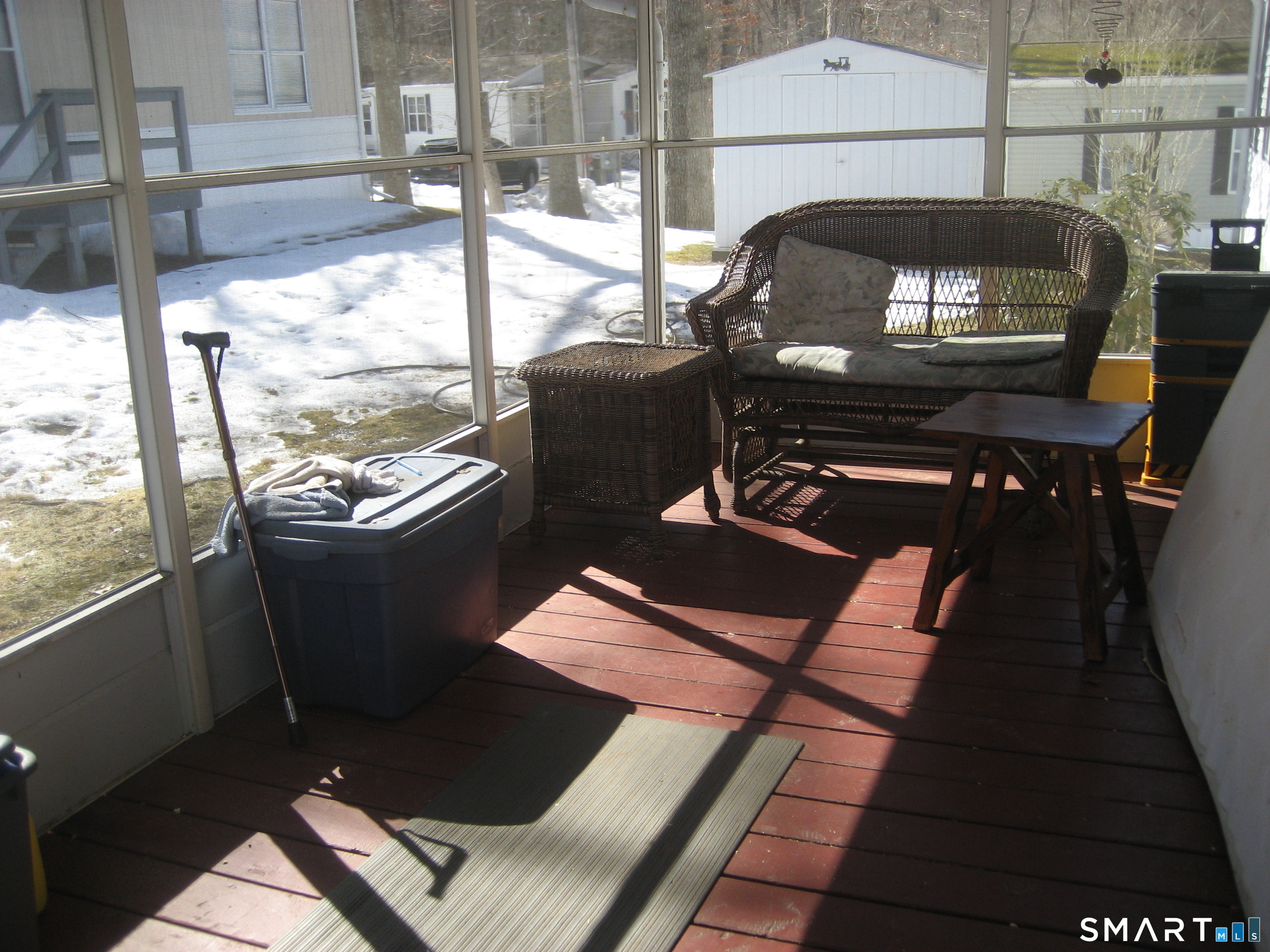 136 Hunters Road Norwich, CT 06360 - Photo 3 of 16 a view of a living room and a wooden floor