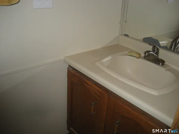 a bathroom with a sink and a vanity