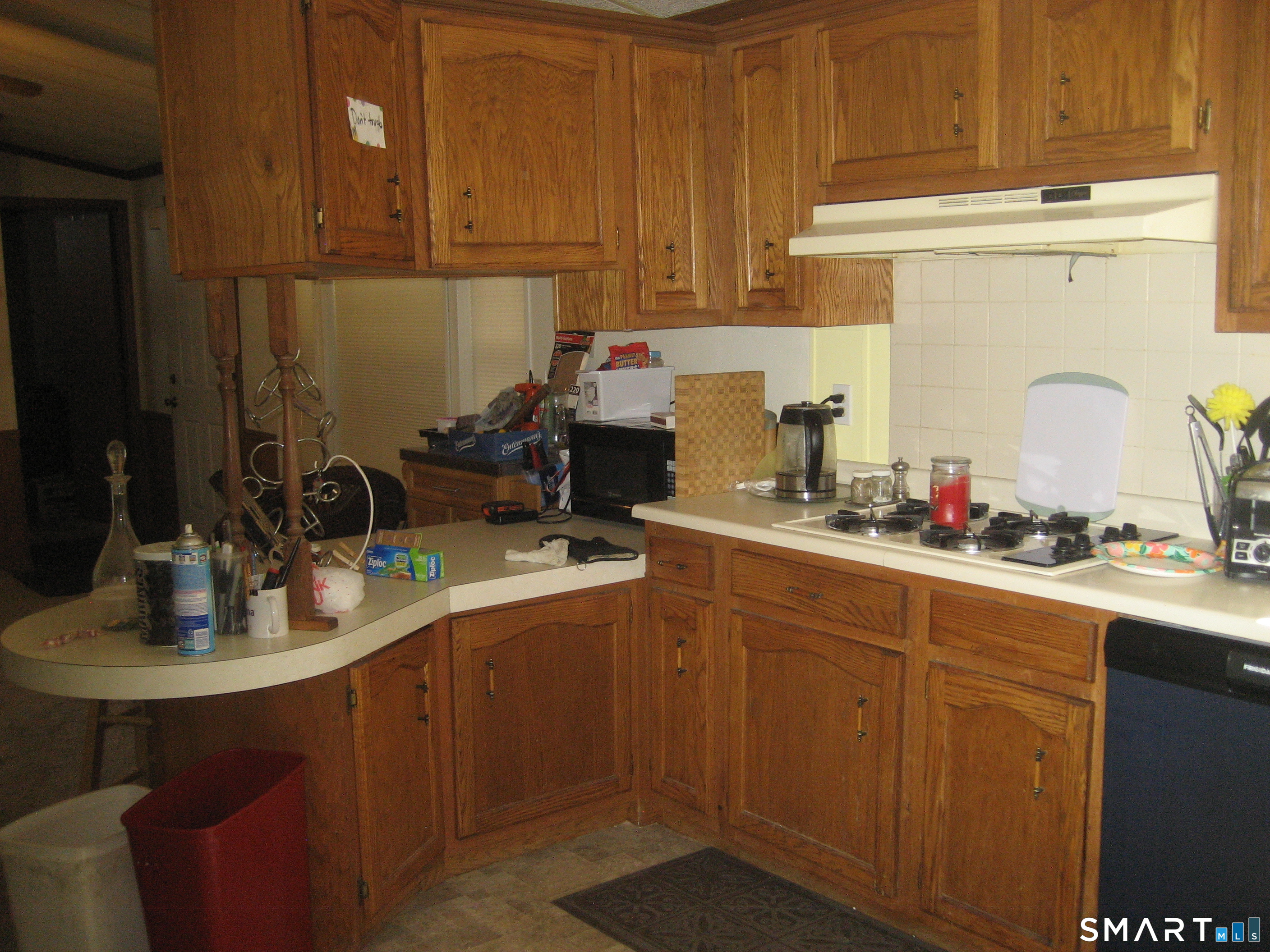 136 Hunters Road Norwich, CT 06360 - Photo 9 of 16 a kitchen with a sink and cabinets