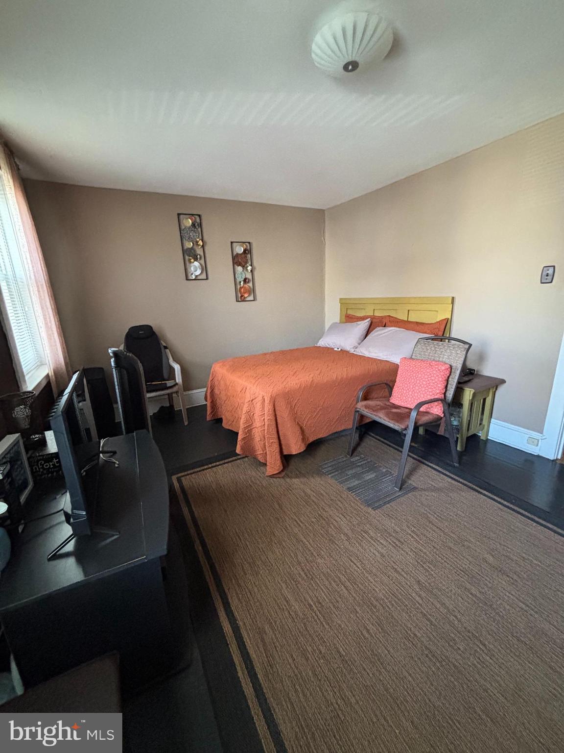 804 Kenmore Road Philadelphia, PA 19151 - Photo 13 of 28 a bedroom with two beds and wooden floor