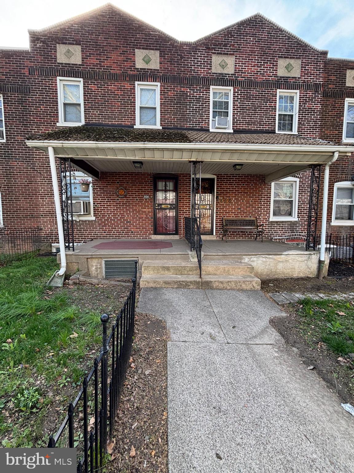 804 Kenmore Road Philadelphia, PA 19151 - Photo 2 of 28 a front view of a house with garden