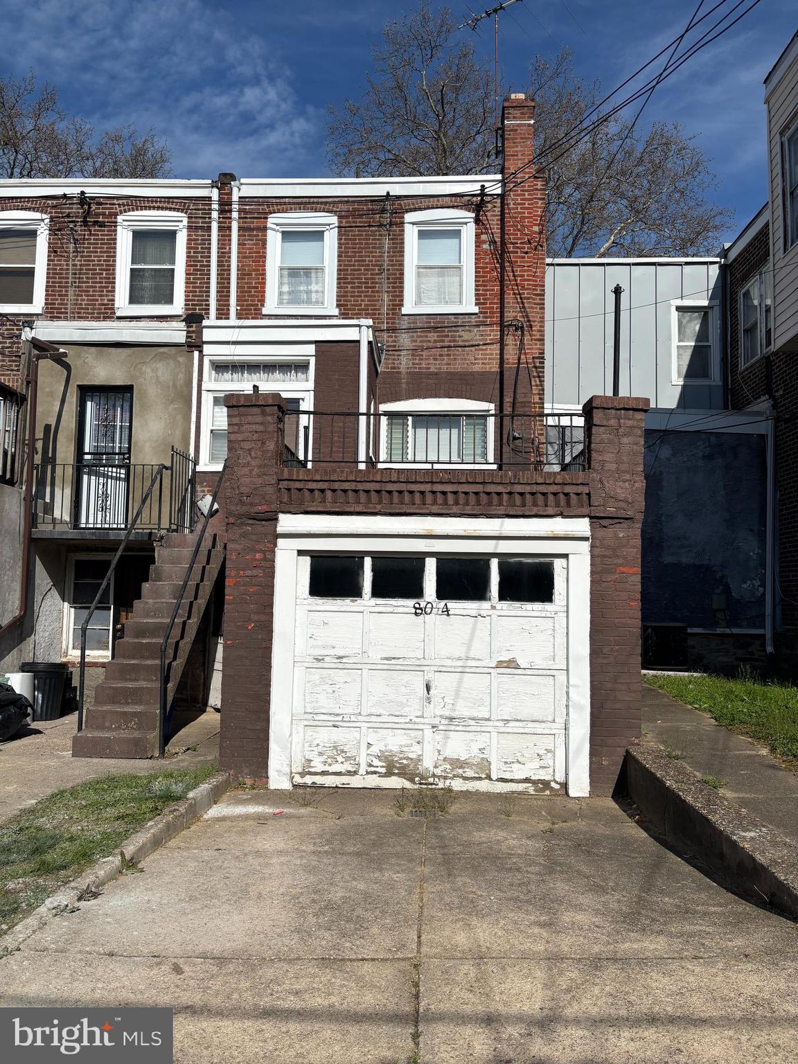 804 Kenmore Road Philadelphia, PA 19151 - Photo 28 of 28 a front view of a house with a yard