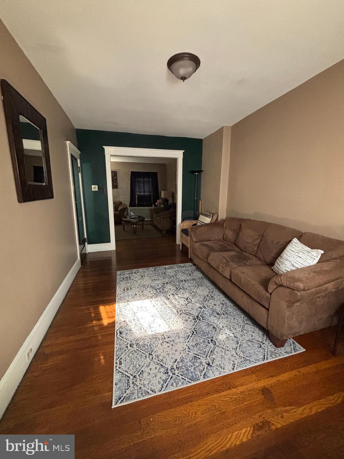 804 Kenmore Road Philadelphia, PA 19151 - Photo 8 of 28 a living room with furniture and a rug