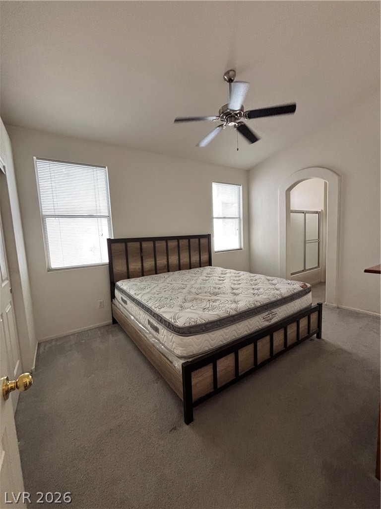 2661 Hillgrass Road Las Vegas, NV 89123 - Photo 12 of 27 Bedroom featuring dark carpet and a ceiling fan