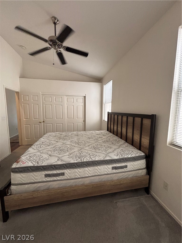 2661 Hillgrass Road Las Vegas, NV 89123 - Photo 14 of 27 Bedroom featuring vaulted ceiling, ceiling fan, a closet, and dark carpet